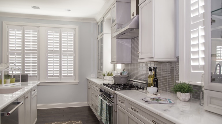 Polywood shutters in Dallas kitchen with modern appliances.